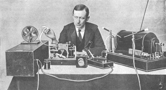Marconi at desk
